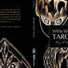 Book cover for White Witch Tarot by Schiffer Publishing, Ltd., featuring elaborate gold and white mystical designs on a black background with glowing illustrations—ideal for Tarot meditation.
