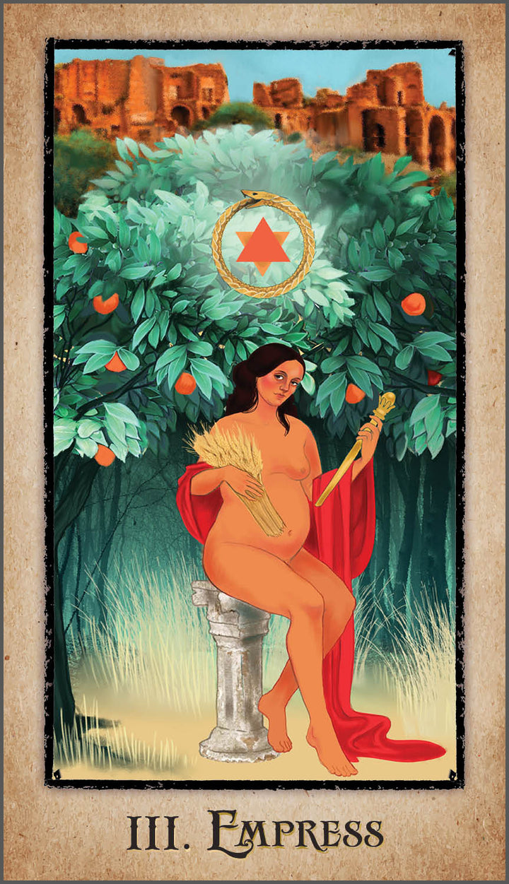 A pregnant woman in red sits on stone, holding wheat and a scepter amid fruit trees and ruins. The card reads III. Empress—a classic Major Arcana image from The American Renaissance Tarot by Schiffer Publishing, Ltd.