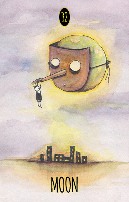 A whimsical illustration from Shadowland Lenormand by Schiffer Publishing, Ltd.: a mask-like moon with a dangling figure above a town, numbered 32 with "MOON" beneath, evoking classic Lenormand cartomancy imagery.