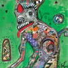 A vibrant abstract creature with large eyes, a red tongue, and spirals sits on a bright green backdrop. Geometric shapes and playful details add flair. "CHARIOT" appears below in white. From Outsider Art Tarot by Schiffer Publishing, Ltd.