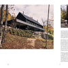 Second Home by Schiffer Publishing, Ltd. features a modern black house with large windows on a hillside, surrounded by autumn trees and rocks—a sanctuary architect-designed for rejuvenation amid nature’s beauty.