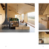 Second Home by Schiffer Publishing, Ltd. showcases a modern, architect-designed house with open-plan living, wood-paneled walls and ceiling, central fireplace, minimalist furniture, large windows, sleek wooden kitchen, and built-in storage.