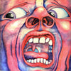 A surreal close-up painting of a distorted, screaming face in bold reds, blues, and purples captures intense energy—ideal as heavy metal album art or for fans of The Art of Metal by Schiffer Publishing, Ltd.