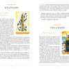 An open book from the Steele Wizard Tarot by Schiffer Publishing, Ltd. reveals the Ace and Two of Wands, featuring vivid illustrations of a hand grasping a wand and a figure gazing over a landscape, alongside detailed card meanings.