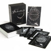 The Nightfall Tarot by Schiffer Publishing, Ltd. is shown with its box, guidebook, a card stack, and five cards fanned out—all featuring dark monochromatic art inspired by the Rider-Waite-Smith Tarot.