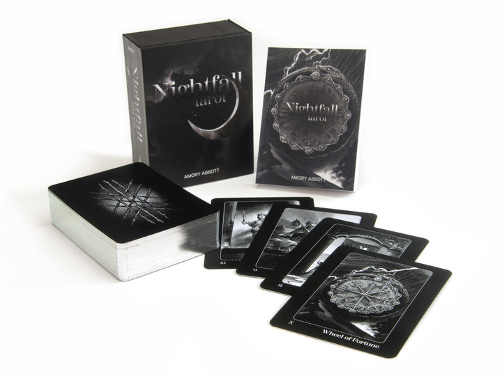 The Nightfall Tarot by Schiffer Publishing, Ltd. is shown with its box, guidebook, a card stack, and five cards fanned out—all featuring dark monochromatic art inspired by the Rider-Waite-Smith Tarot.