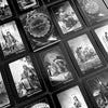 A black and white photo shows Schiffer Publishing, Ltd.'s Nightfall Tarot cards in a grid pattern, displaying detailed illustrations and labels like The Magician, Wheel of Fortune, and Queen of Pentacles.