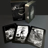The Nightfall Tarot deck by Schiffer Publishing, Ltd. is shown with its box and three black-and-white cards—Ten of Swords, Page of Swords, and Nine of Pentacles—inspired by Rider-Waite-Smith Tarot imagery.