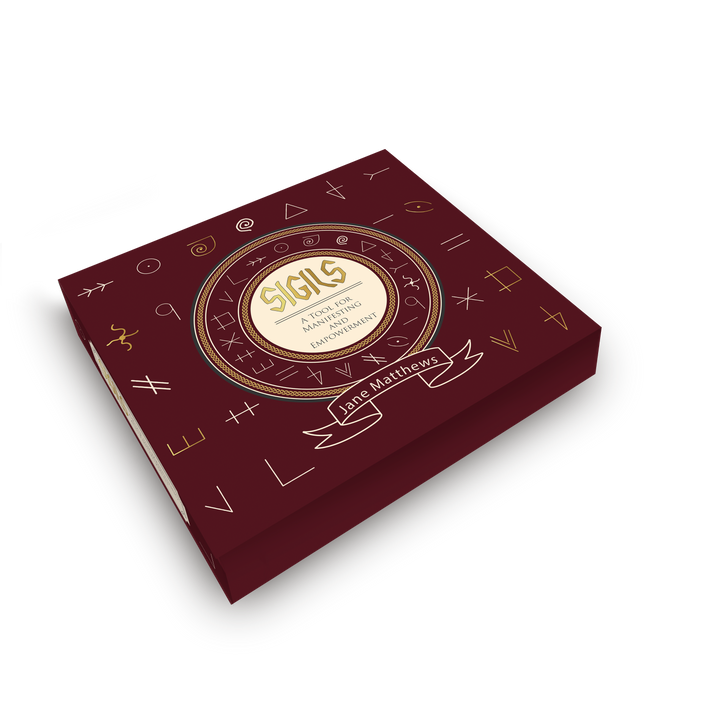 A maroon box titled Sigils from Schiffer Publishing, Ltd., with gold and white mystical symbols and a central circle, perfect for divination and manifestation practices.