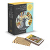 A box of The Time Changer's Tarot by Schiffer Publishing, Ltd. is shown beside a modern tarot deck and a spiral-patterned card. The Waite-Smith-inspired box displays a tree with tarot images and a yellow title section at the top.