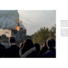 The book "Restoring Notre-Dame de Paris" by Schiffer Publishing, Ltd. explores the aftermath of the Notre-Dame fire, featuring dramatic images of smoke and flames rising above the cathedral as crowds watch from below.