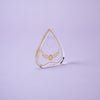 The Crystal Spirit Talking Board and Guidebook by Schiffer Publishing, Ltd. glows on a light purple background, radiating sacred crystal energy like a transparent award with gold laurel and star designs.
