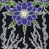 The Devil card from The Animystic Tarot by Schiffer Publishing, Ltd. shows a large purple flower with yellow center, green leaves, blue bell-shaped flowers, and white swirling lines on a dark background.