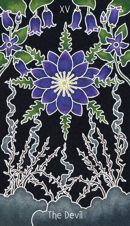 The Devil card from The Animystic Tarot by Schiffer Publishing, Ltd. shows a large purple flower with yellow center, green leaves, blue bell-shaped flowers, and white swirling lines on a dark background.