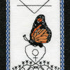 The Butterfly Wisdom Tarot by Schiffer Publishing, Ltd. features The Empress card: a monarch butterfly on a Venus symbol, decorative patterns below, a blue patterned border, and the number III at the top, reflecting transformative healing.