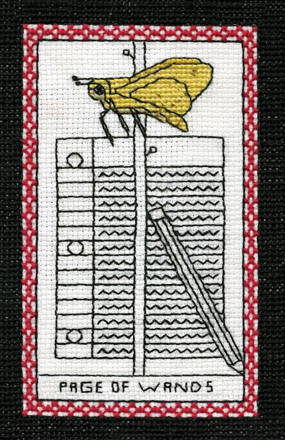 A cross stitch featuring a butterfly and a pen, inspired by The Butterfly Wisdom Tarot from Schiffer Publishing, Ltd., symbolizing transformative healing and new beginnings.