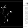 A black-and-white photo of blues musician John Lee Hooker, in a hat and playing guitar, fills the left. On the right, text for Chapter 1: Modern Blues Founders details Hooker's impact. From Inside the Moment by Schiffer Publishing, Ltd.
