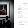 A dramatically lit portrait of Robert C. Jackson hangs on the wall, with four dark balloon dog sculptures in front. Next to it is a table of contents. Product: Robert C. Jackson by Schiffer Publishing, Ltd.