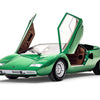 A green Automobili Lamborghini by Schiffer Publishing, Ltd. luxury sports car with both scissor doors open, viewed from the front left on a white background.
