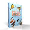 Backyard Birds of North America by Schiffer Publishing, Ltd. features bird identification illustrations on a light blue cover with orange and white text. The upright book displays its spine.
