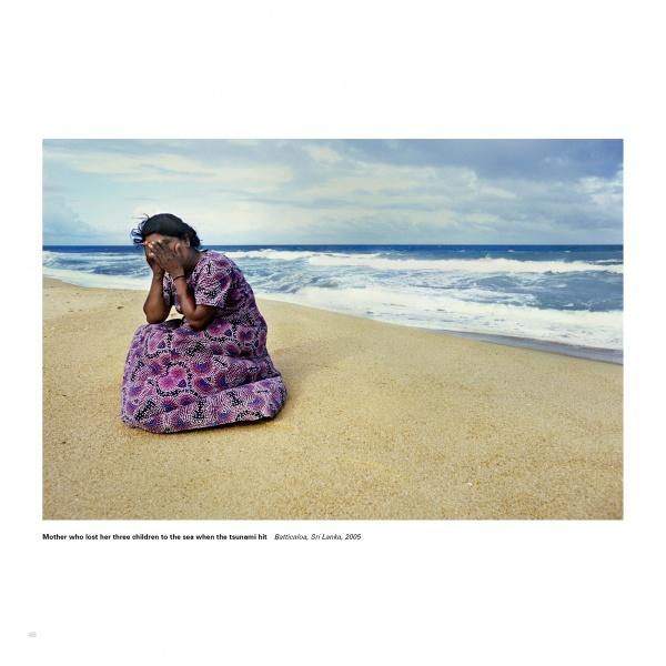 In "Face to Face" by Schiffer Publishing, Ltd., a woman in a patterned dress sits alone on a sandy beach, her face buried in her hands, evoking grief amid rolling ocean waves and a cloudy sky—a striking example of documentary photography.