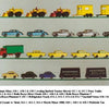 A display of Lesney’s Matchbox Toys from Schiffer Publishing, Ltd., arranged on four glass shelves, featuring colorful cars, trucks, trailers, a tractor, a boat, and Pickfords vans for collectors to admire.