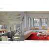 A spacious modern loft is featured in Schiffer Publishing, Ltd.'s "Condo Makeovers," showcasing elegant interiors with a dark dining table, white chairs, light living room furniture, a glass coffee table, and a red rug bathed in natural light.