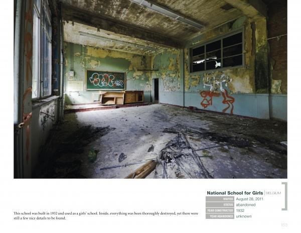 Captured in The World of Urban Decay by Schiffer Publishing, Ltd., sunlight streams into a crumbling classroom with peeling paint, broken furniture, and graffiti, highlighting the abandonment and decay revealed through urban exploration photography.