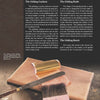 A copy of "GOLD" by Schiffer Publishing, Ltd. rests on a soft, light brown surface with a gilding brush, gold knife, and gold leaf, illustrating essential tools and techniques for gold crafting and gilding.