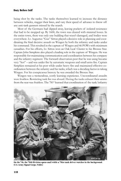 Black and white photo from Duty Before Self: The Story of the 781st Tank Battalion in World War II (Schiffer Publishing, Ltd.) shows soldiers in helmets and uniforms, one with a submachine gun, as a tank driver watches from a Sherman Easy Eight hatch.