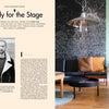 A spread from "Home Story" by Schiffer Publishing, Ltd. features a left page with text and a black-and-white photo of a man in a coat, and a right page showcasing German interior design with marble walls, green accents, and wooden furniture.