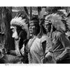 Pueblo Dancing" by Schiffer Publishing, Ltd. features a black and white image of three people in traditional Pueblo dress and headdresses performing an outdoor dance, with the central figure holding decorated objects and wearing beaded necklaces.
