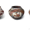 Birds in the Barnes Foundation" by Schiffer Publishing, Ltd. features three round clay pots with wide openings and painted bird and floral motifs in earthy browns, reds, and blacks, set against a plain white background.