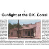 A historic building with an O.K. Corral sign stands in Tombstone, Arizona. Featured in Schiffer Publishing, Ltd.'s "Tombstone," the image highlights the famed Wild West town and its legendary gunfight.