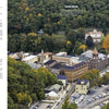 Aerial view of a small town in The Poconos, featuring historic buildings and autumn foliage amid dense green forest. Scenic photo highlights the landscape, with Schiffer Publishing, Ltd. text overlays in the top left and center.