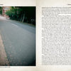 A photo of a quiet, leaf-strewn street borders a book page from "Haunted Charlotte" by Schiffer Publishing, Ltd., featuring ghost stories about a historic intersection.