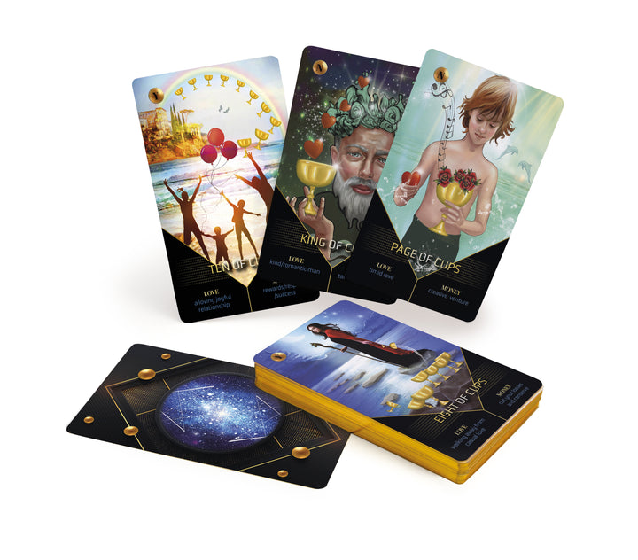 A set of Clarity Tarot cards by Schiffer Publishing, Ltd. is displayed, showing the Ten, King, and Page of Cups upright with additional face-down cards and a starry galaxy design—ideal for tarot readings.